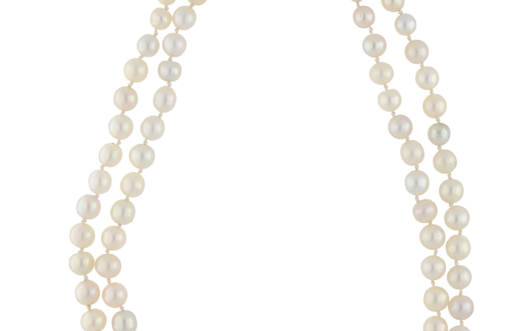 Collier de perles fines fermoir en or 18K serti de diamants